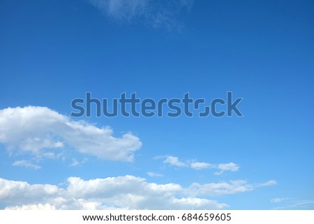 Blue Sky with Clouds Background, Top Space for Text.