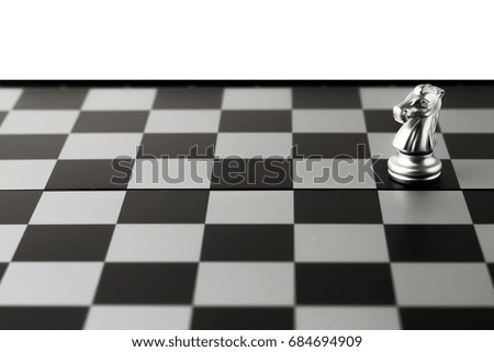 Alone : Chess game or chess pieces.