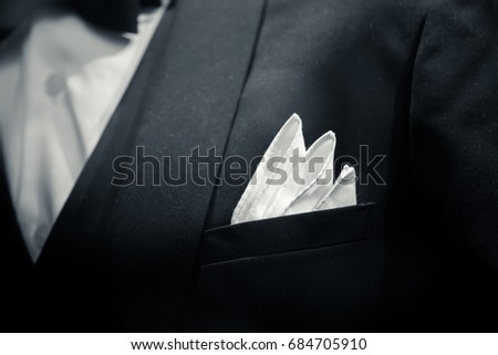 gentle man closeup groom tuxedo suit for luxury dinner black and white art tone. Royalty-Free Stock Photo #684705910