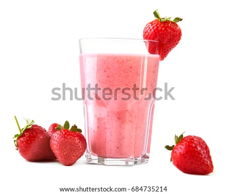 A close-up picture of blended strawberries squeezed in a smoothie. A transparent glass of a sweet shake isolated on a white background. Delicious and ripe strawberries and an organic yogurt. 