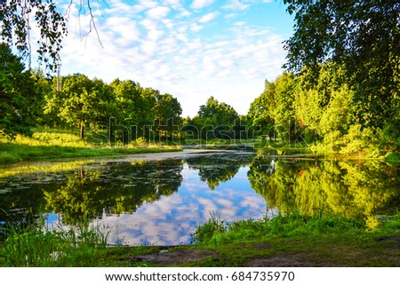 Beautiful view of the lake. Early morning. Summer. Russia. Moscow region. Royalty-Free Stock Photo #684735970