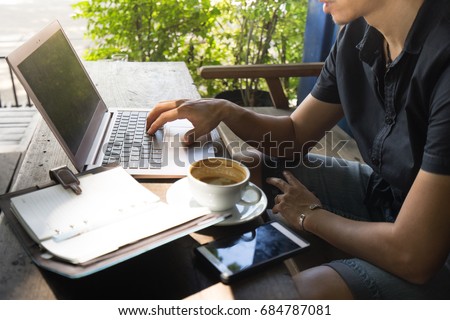 Smart asian man digital nomad sit and working on freelance project using portable computer ,smartphone and making notes in the paper note. Royalty-Free Stock Photo #684787081