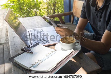Smart asian man digital nomad sit and working on freelance project using portable computer ,smartphone and making notes in the paper note. Royalty-Free Stock Photo #684787090