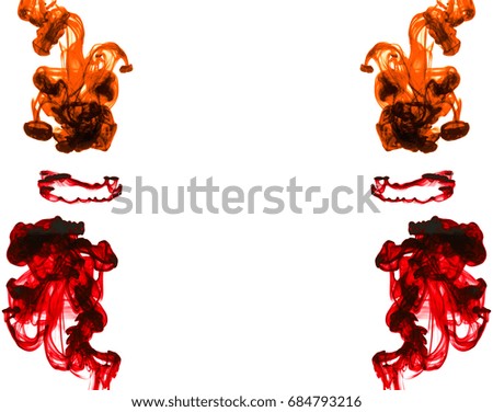 Color drop in water photographed in motion. Cloud of colorful ink in water isolated on white. Abstract background.