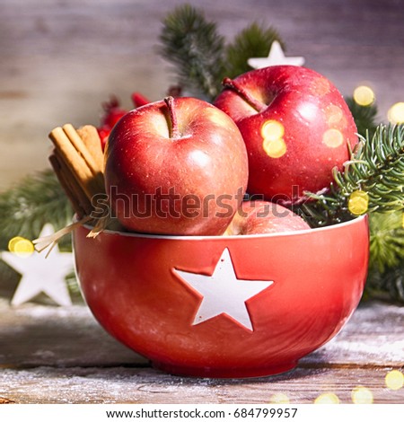 Rustic Christmas background with red apple