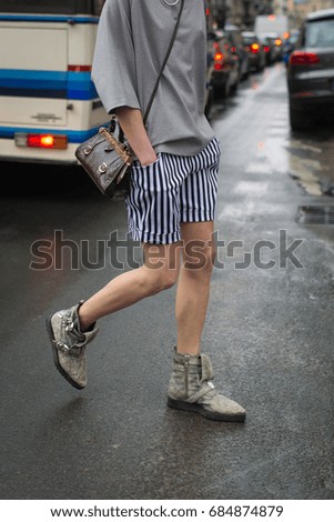 Fashionable young woman on a street