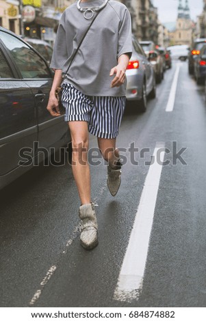 Fashionable young woman on a street