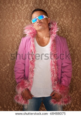 Native American male rockstar with sunglasses and a pink fluffy jacket