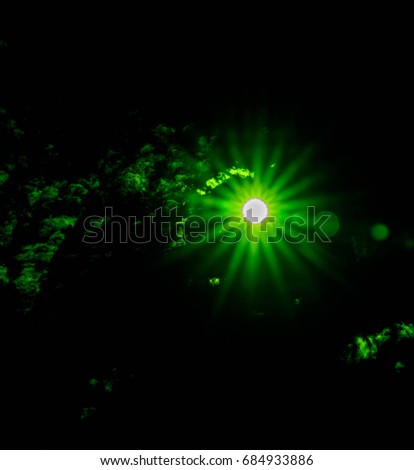 Abstract of green sun with flare background, Beautiful rays of light.digital lens flare