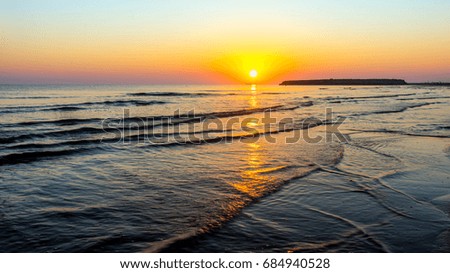 Bright colorful sunrise at sea