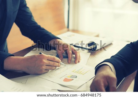 Project managers meeting.Business crew working with new startup,Teamwork concept,Businessman discussion graph document in the office.collaborative filtering.Analyze plans.selective focus,vintage color
