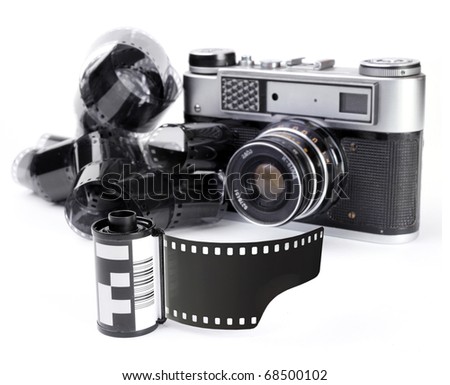 Vintage camera with a 35mm film on a  white background.