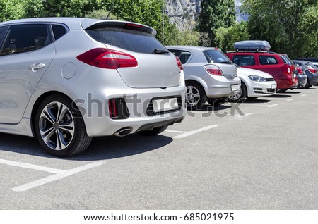 City parking for cars on the street. Close-up. Royalty-Free Stock Photo #685021975