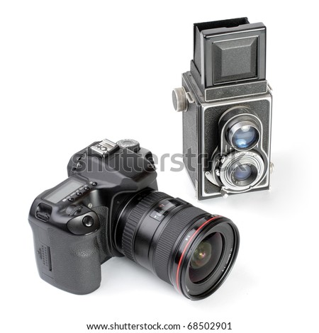 Modern dslr camera and vintage medium format two-lens camera. Picture of evolution in photographic technology.
