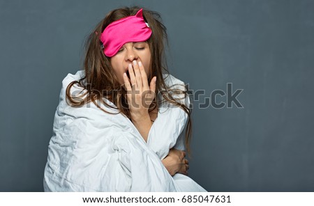 Yawn woman wake up portrait isolated on wall background. Royalty-Free Stock Photo #685047631