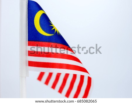 Malaysia flag also known as Jalur Gemilang wave isolated over white background. Conceptual photo for the Independence Day Celebration or Merdeka Day, 31 of August.
