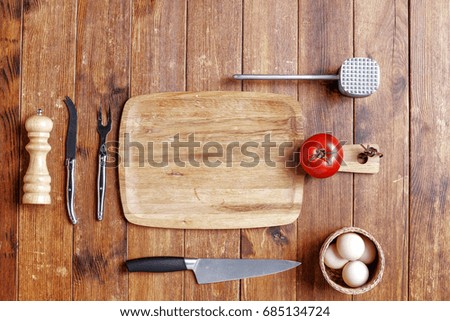 flat photo of kitchen tools on brown desk space 
