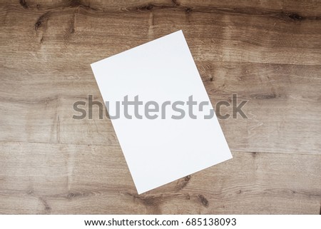 White template paper on wooden background