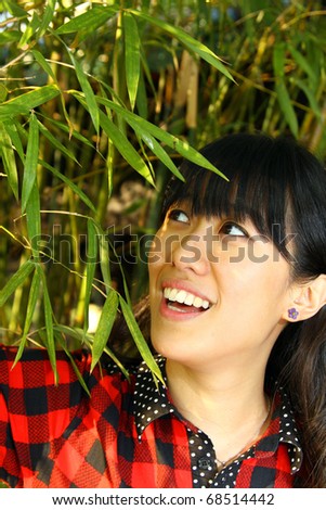A very cheerful Chinese girl smiling