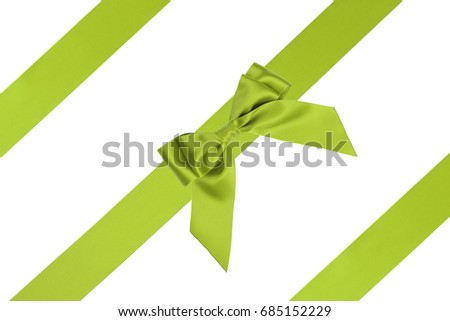 Gift lime bow with parallel silk ribbon isolated on white 