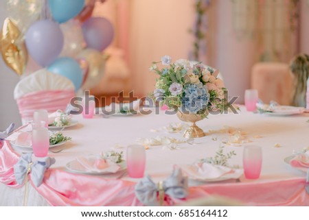 table with a variety of beautiful flowers