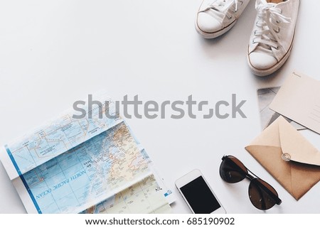 Top view of map vintage and sunglasses,travel concept