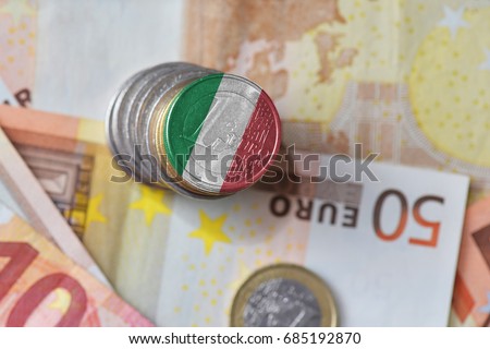 euro coin with national flag of italy on the euro money banknotes background. finance concept Royalty-Free Stock Photo #685192870