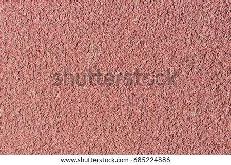 Red color asphalt texture background.