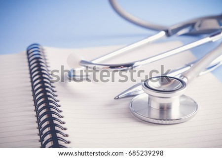 stethoscope and books with filter effect retro vintage style