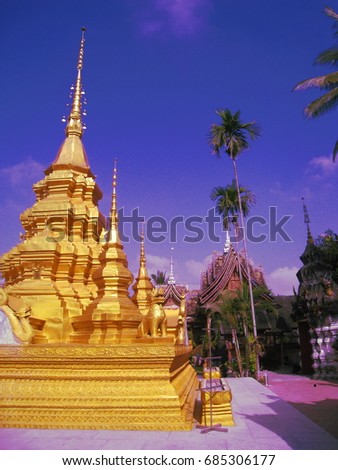Thai style pagoda Buddist temple in Southern China tourist attraction area.