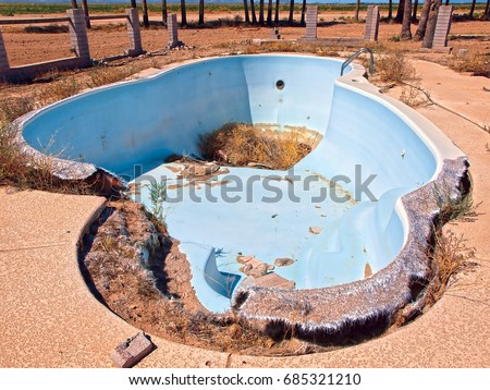An abandoned swimming pool I found while exploring the Arizona desert near the Eagle Tail Mountains in Harquahala Valley. The home this pool belonged to had burned down long ago.