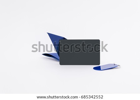 Mockup of black plastic business card with rounded corners with blue token and dark blue paper butterfly