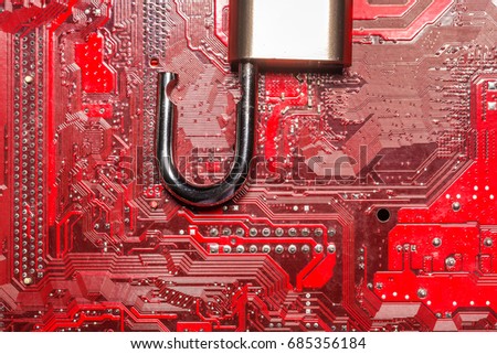 padlock on a computer circuit board
