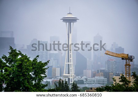 cloudy and foggy day with seattle skyline
