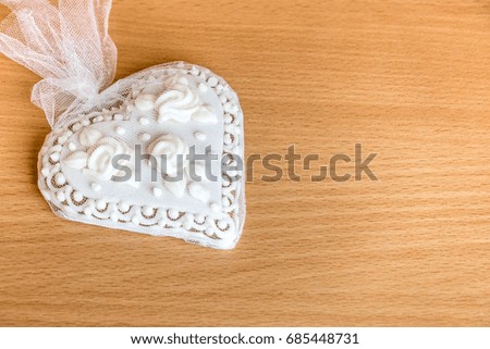gingerbread heart cookies on wooden table background