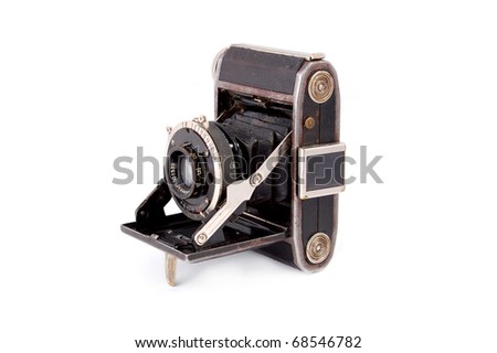 Old vintage camera, isolated on white background