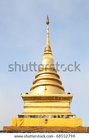 the gold prang in temple of thailand