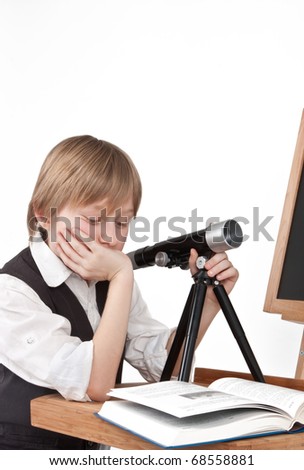 School boy doing astronomy homework
