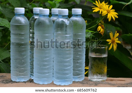 Bottles and glass of fresh and pure water for health