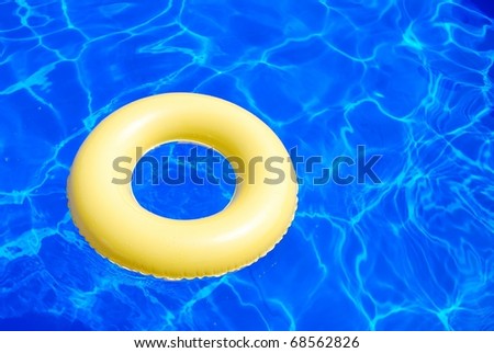 Swimming pool with toys Royalty-Free Stock Photo #68562826