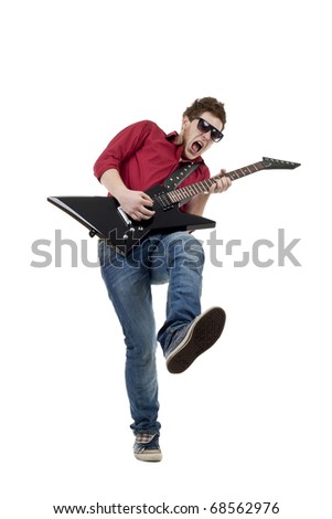 Passionate musician with sunglasses playing the guitar, isolated