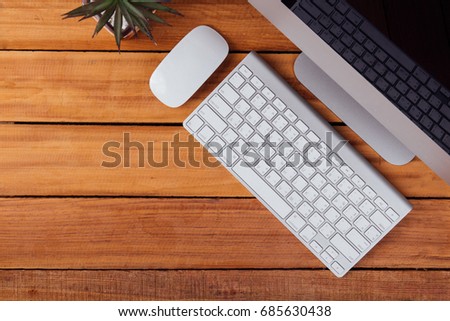 Creative flat lay photo of office workplace desk with tablet on wood table