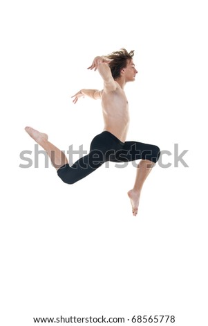 ballet dancer practicing high jumps over white background