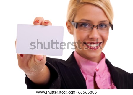 Beautiful business woman smiling and holding a white card