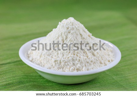 Finely milled refined wheat flour (maida) in a white bawl Royalty-Free Stock Photo #685703245