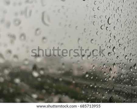 Rain Drops through the glass window 