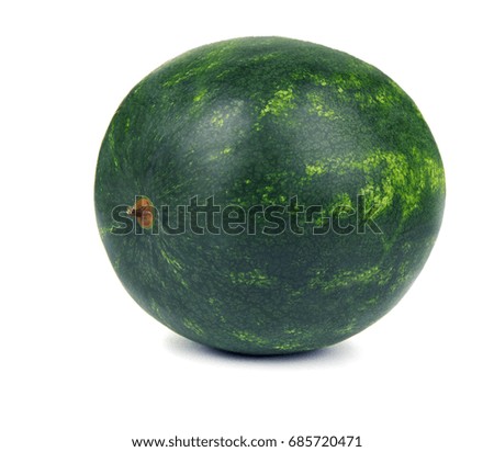 Close-up picture of a fresh and perfect round striped watermelon, isolated on the white background. The big berry is full of vitamins. Healthful and organic food for vegetarian.