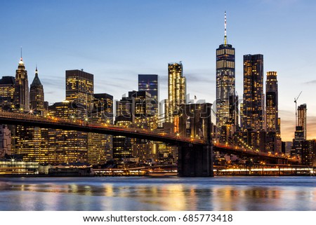 Brooklyn Bridge and New York City Skyline at Sunset