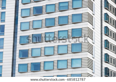 Abstract view of modern facade glazing with sky reflection