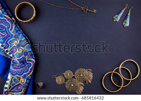 Female indian jewellery accessories on black background Royalty-Free Stock Photo #685816432